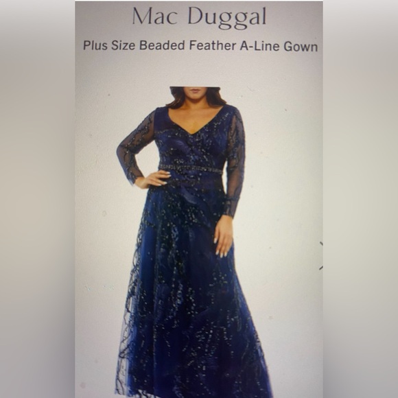 Gorgeous beading and hem line! Worn as Mother of the groom dress once!